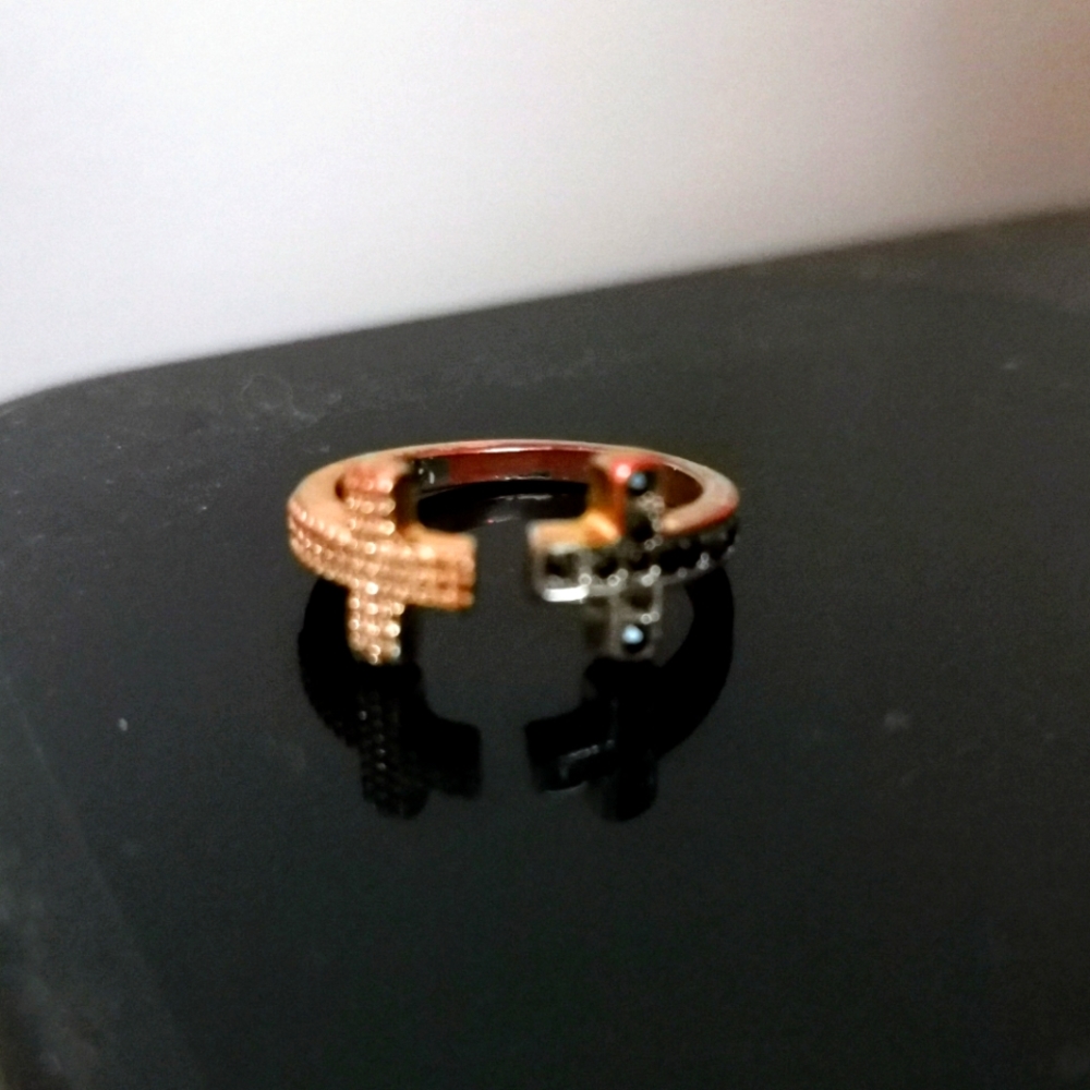 Gold and black cross ring